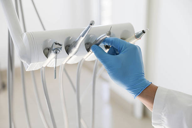 Professional Tooth Extraction technician working in Clarksville, IN